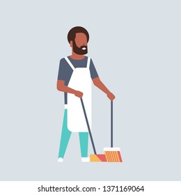 man sweeping floor with broom and scoop african american guy doing housework house cleaning concept male cartoon character full length flat gray background