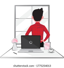 A man take a break from business at work looking out from the window and turn his back from computer