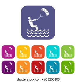 Man takes part at kitesurfing icons set vector illustration in flat style in colors red, blue, green, and other