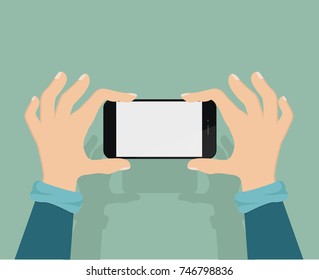 Man taking a picture with  smart-phone