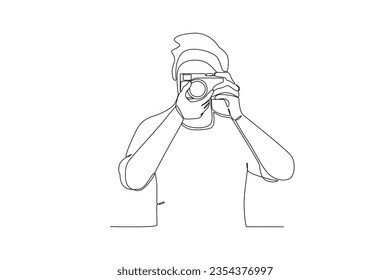 A man taking pictures. World photography day one-line drawing