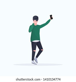 man taking selfie photo on smartphone camera casual male cartoon character posing on white background flat full length