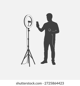 Hombre tomando selfie con la luz del anillo
