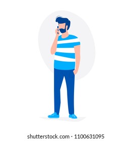 A man is talking by phone with one hand in a pocket