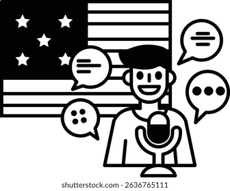 A man is talking into a microphone in front of an American flag. The man is smiling and the flag is black and white