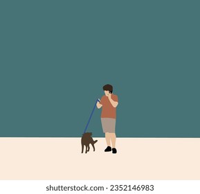Man talking on mobile phone and holding his dog on leash on city street. Having fun together outdoors
