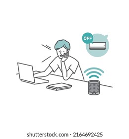 A man talking to a smart speaker placed on a study desk (turns off the air conditioner)