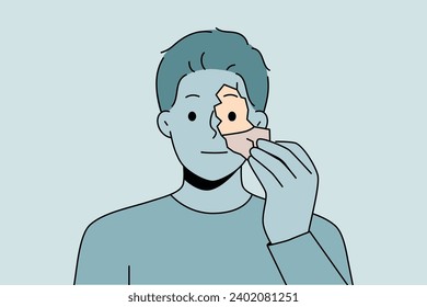 Man tears off fragment of own face to change shell and get rid of psychological problems. Unemotional guy needs self-renewal to improve psychological health and eliminate depressive thoughts