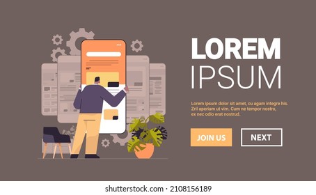 man technician working on smartphone repairing mobile application setting option adjusting application