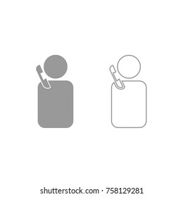 Man with telephone grey icon .