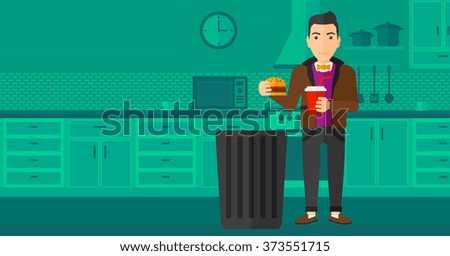 Man throwing junk food.
