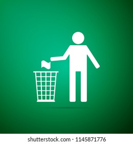Man throwing trash into dust bin icon isolated on green background. Recycle symbol. Flat design. Vector Illustration