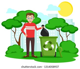 Man throws a black bag in the trash on the background of nature. Ecology