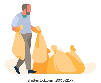 Man throws plastic bags to pile. Garbage stockpile