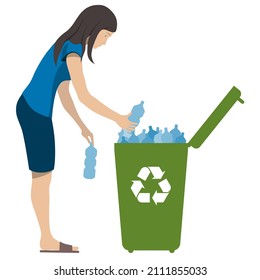 A man throws plastic bottles into a trash can.