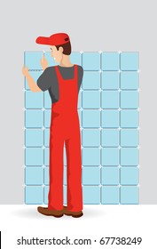 Man tiling a wall in the room