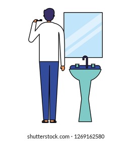 man with toothbrush in the bathroom
