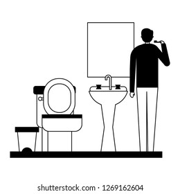 man with toothbrush in the bathroom