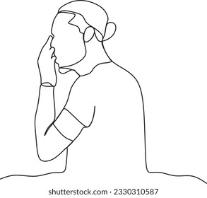 man touching his face because it hurts