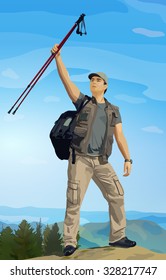 Man tourist with hiking poles in hand standing on mountain top