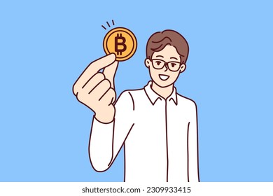 Man trader with bitcoin coin calls for mining or investing in cryptocurrency and blockchain technology. Guy in glasses and formal wear recommends buying bitcoin money for anonymous or secure payments