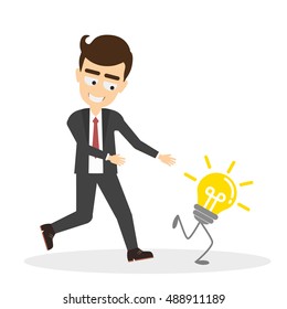 Man tries to chase idea light bulb. Concept of creativity, competition and innovation. Funny smiling handsome businessman.