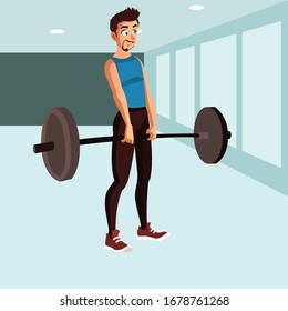 Man tries to lift dumbbell during a workout on the gym
