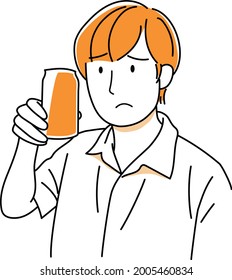 A man with a troubled face holding a can of drink