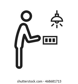 Man Turning Light On