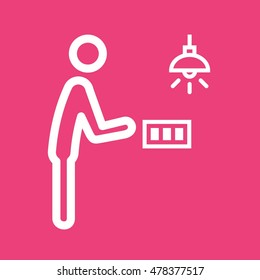 Man Turning Light On