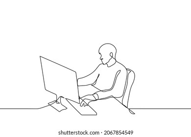 man typing on keyboard in front of computer - one line drawing vector. concept of working at stationary computer; worker at work; freelancer working from home (copywriter, writer, journalist)