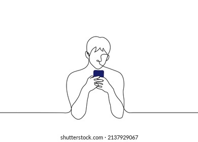 man typing on phone - one line drawing vector. concept of intensive correspondence on phone in social networks or playing mobile games 