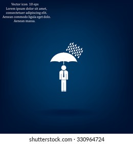 a man with an umbrella in the rain