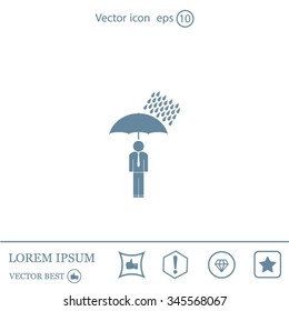 a man with an umbrella in the rain