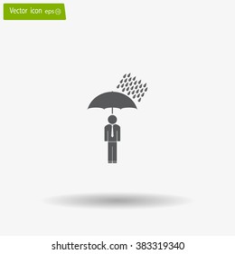 a man with an umbrella in the rain