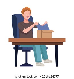 man unboxing present in the office