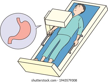 A man undergoing a stomach x-ray