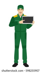 Man in uniform pointing at digital tablet PC. Full length portrait of Delivery man or Worker in a flat style. Vector illustration.