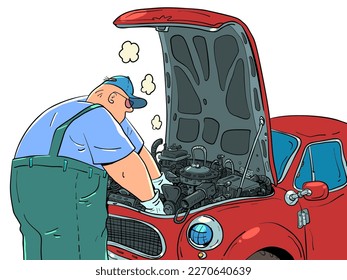 A man in uniform repairs a car. auto repair shop garage A professional works in a car service. Maintenance for driver safety.