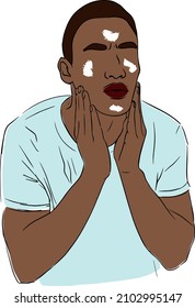 Man uses face cream. Handsome guy doing hygiene and beauty procedure.