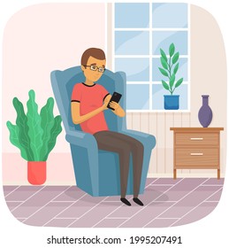 Man uses smartphone while sitting on chair. Internet surfing or reading article. Guy looks at screen of mobile device with application. Male character with glasses uses mobile app on phone