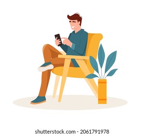 A man uses a smartphone while sitting on a yellow chair. Guy holding smartphone and spending time online. Vector illustration in flat style.