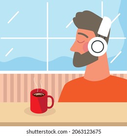 man using earphones with coffee cup