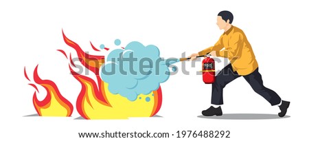 Man using a fire extinguisher to extinguish a fire  Stockfoto © 