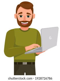 Man using laptop. A man with a beard holds a laptop. Cute man isolated on white background.