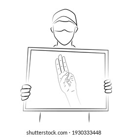 A man using mask showing a paper protest with sign of hand with 3 fingers raised