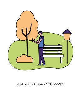 man using mobile in the park