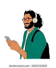 Man using mobile phone, listening music in headset
