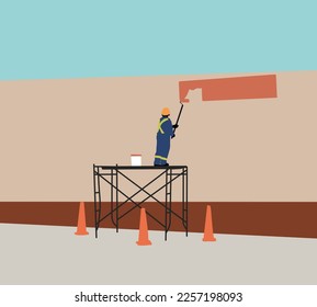 Man using rolling and hand brush to paint street wall. House construction or apartment renovation service.