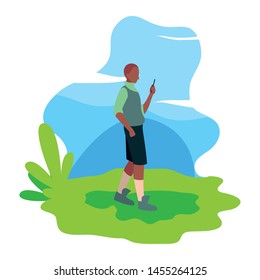 man using smartphone in the landscape